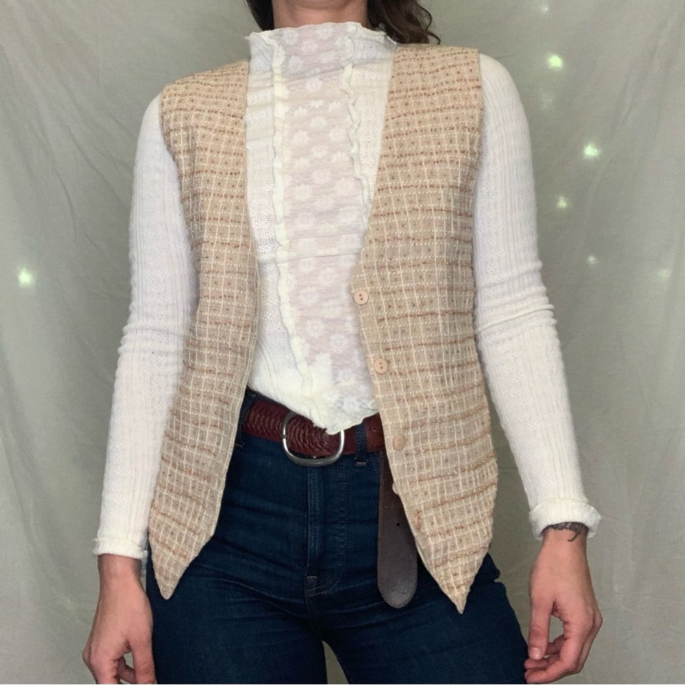 100% cotton size medium hand beaded neutral button up vest. Tie in back.